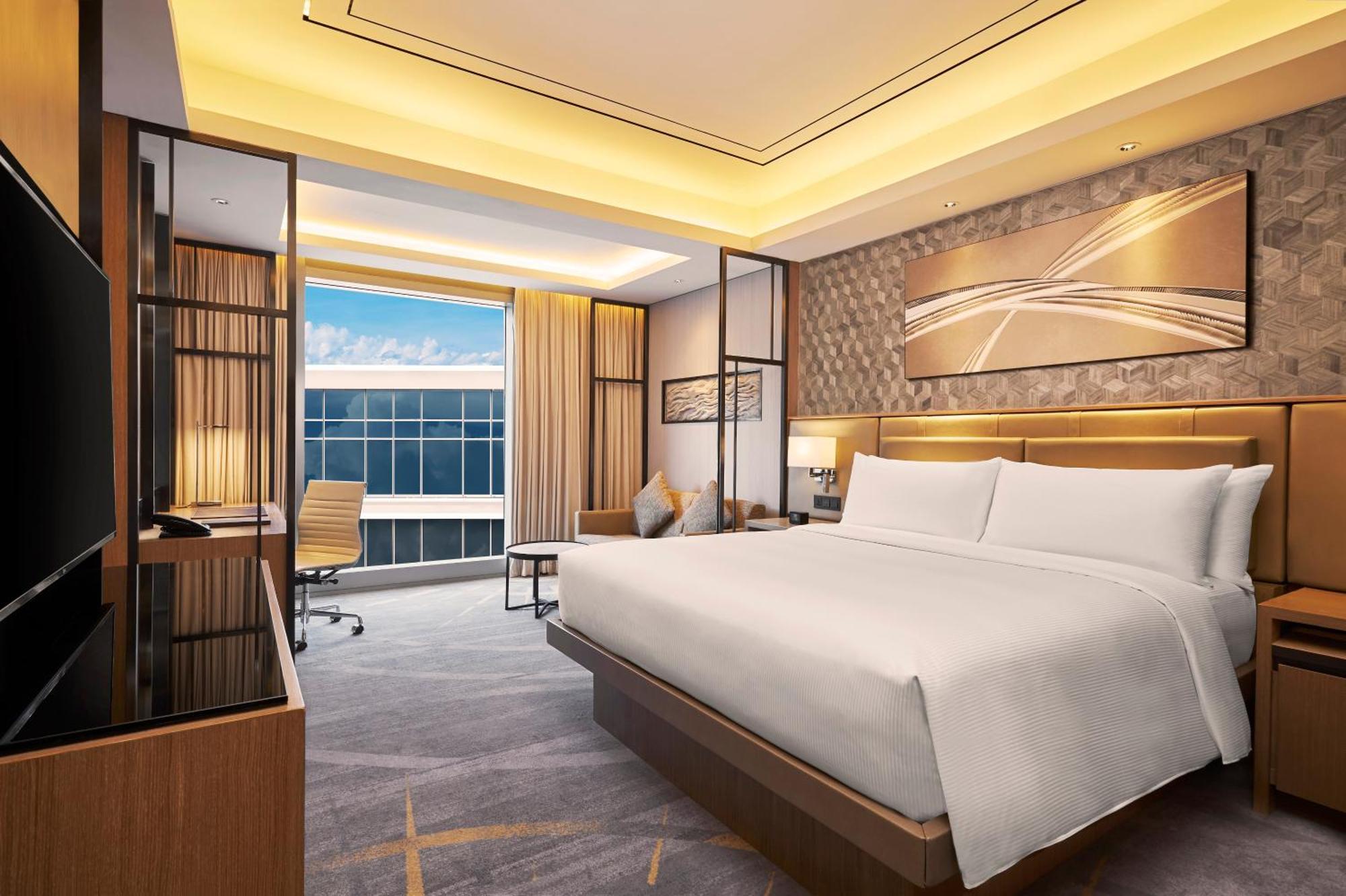 Hilton Manila Hotell Pasay Exteriör bild Deluxe Suite